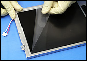 Photo of optical film being applied