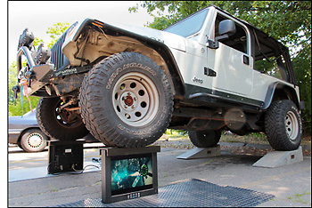 Full weight of Jeep supported by two General Digital LCD monitors