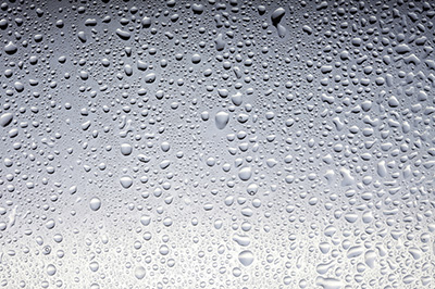 photo of water drops on glass