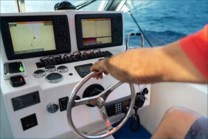 Depth finder displays in boat cockpit